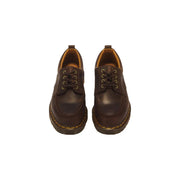 Dunkelbraune Herren-Slipper aus Leder von Dr. Martens mit glatter Oberfläche und flachem Profil