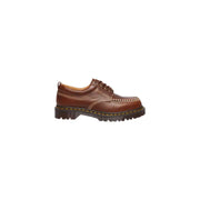 Brown leather dr martens men lowell butterscotch lace up shoes showing detailed texture and stitching