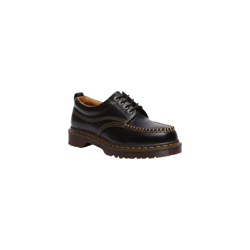 Black leather dr martens men lowell moccasin shoes showing the back side with durable leather material