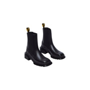 Dr Martens women black leather Chelsea boots with chunky block heel and gold-tone pull tabs