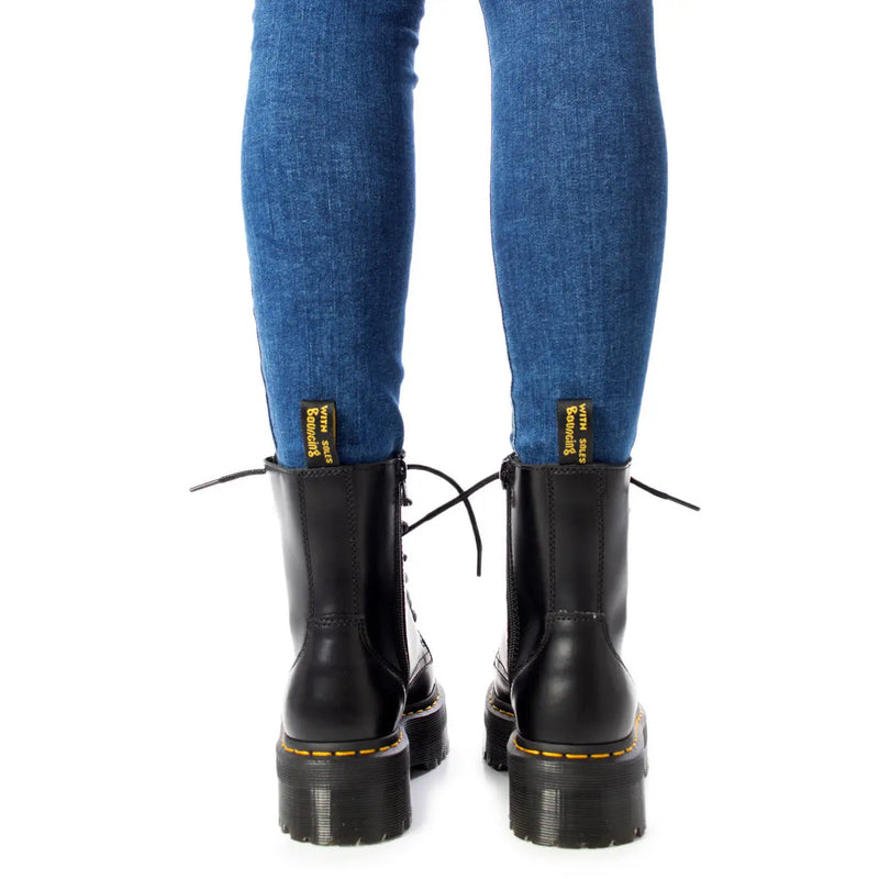 Black leather lace boots for women by dr martens size 4 showing the back side of the boot
