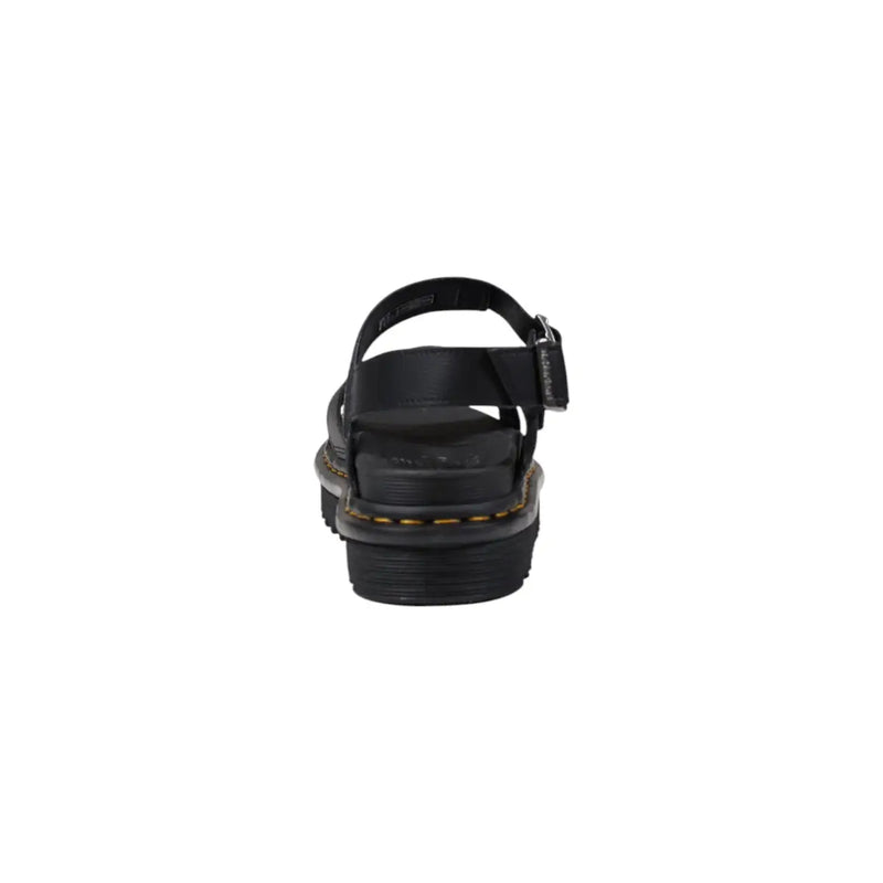 Dr Martens women black leather platform sandals with thick sole, adjustable buckle strap, and signature yellow stitching