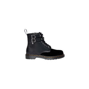 Black dr martens women boots in leather and velvet with a zip closure shown from the back side