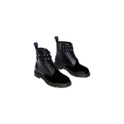 Black leather velvet zip women Dr Martens boots shown from the back side highlighting key design features
