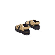 Dr Martens women tan leather buckle sandals with black rubber soles and adjustable straps shown from the back side