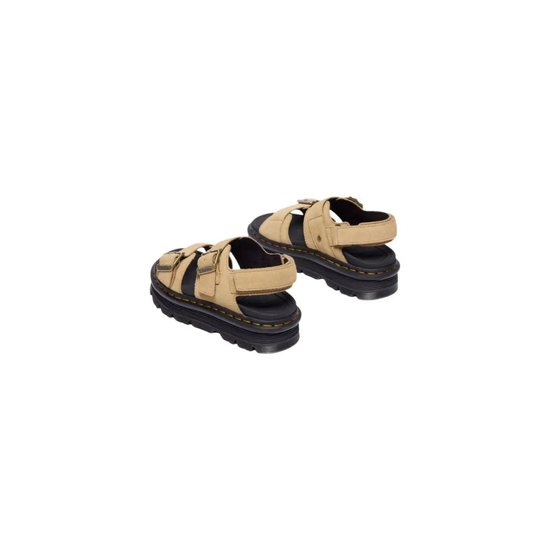 Dr Martens women tan leather buckle sandals with black rubber soles and adjustable straps shown from the back side