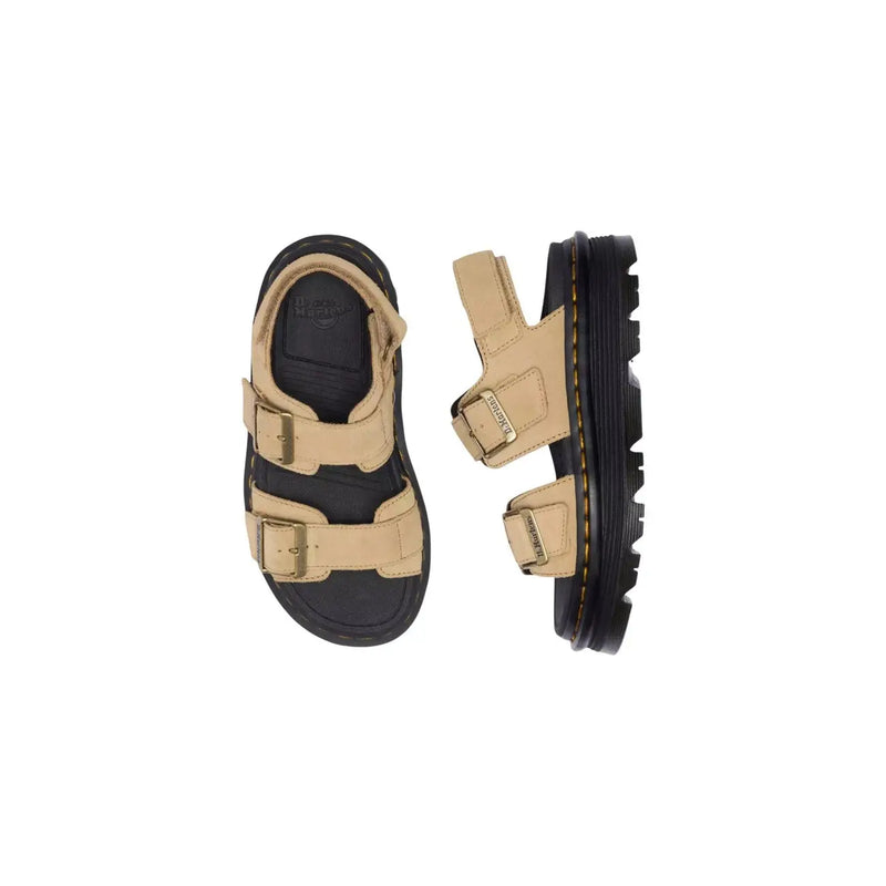 Beige and black Dr Martens women tan leather buckle sandals shown from the back side