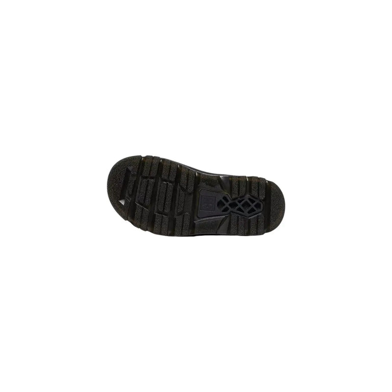 Black rubber sole with textured tread and small rectangular logo near the heel of dr martens women’s black leather ankle boots