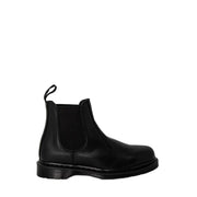 Dr Martens women’s black leather Chelsea boot with elastic side panels and pull tab for fall winter wear