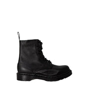 Black leather dr martens women’s boots shown from the back side highlighting their durable leather material