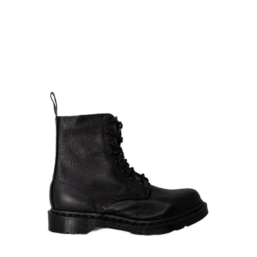 Black leather dr martens women’s boots shown from the back side highlighting their durable leather material