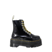 Dr martens women’s black patent leather lace-up boots showing the back side of the footwear