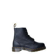 Black leather dr martens women’s fall winter boots shown from the back side with sturdy sole and stitching details