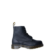Black leather dr martens women’s fall winter boots shown from the back side with sturdy sole and stitching details