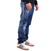 Dark blue slim fit distressed denim jeans with visible white stitching made of cotton elastane by Dsquared2
