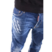Dsquared2 men jeans blue with worn out effect featuring distressed faded wash and white scratch markings on cotton elastane