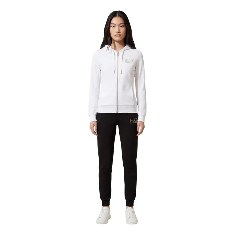 EA7 black hooded zip-up jumpsuit with pockets, white hoodie, black joggers, white sneakers