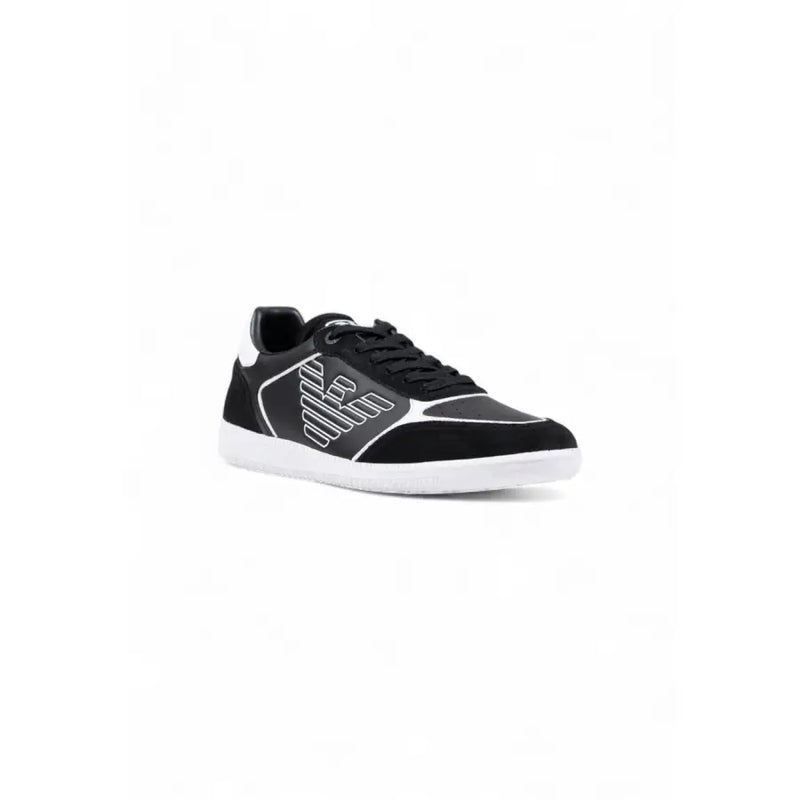 Black and white puma sneaker with suede upper, reflective silver logo.