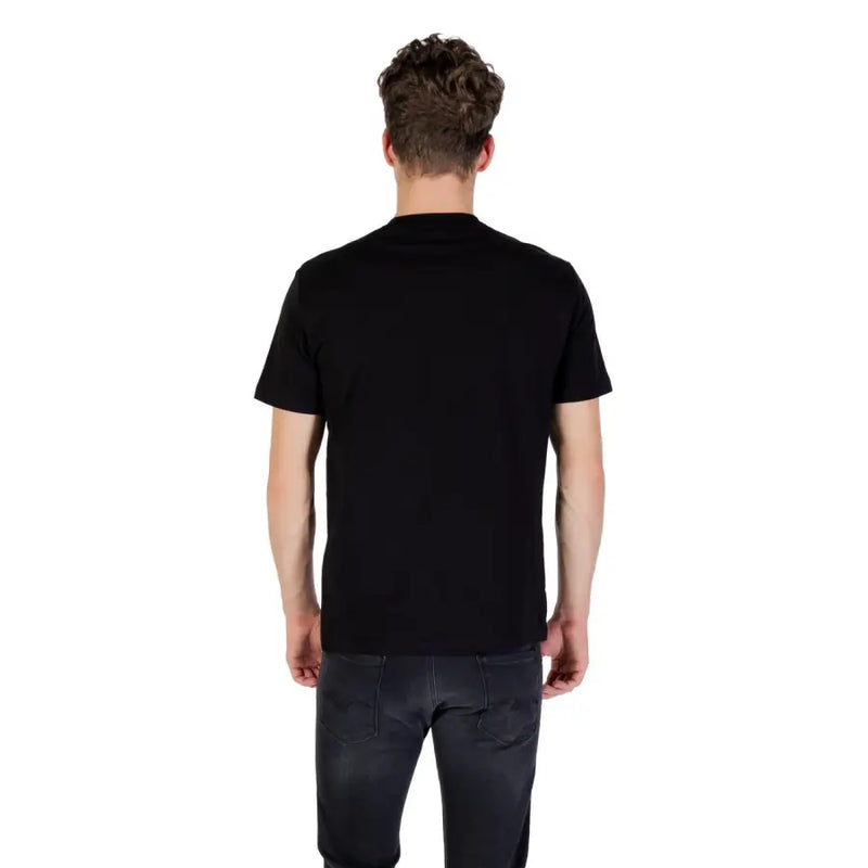 Ea7 Men black round neck cotton elastane T shirt paired with dark grey jeans
