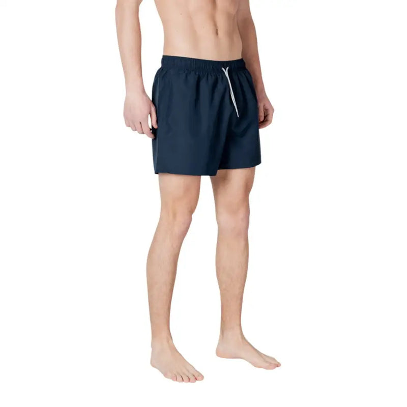 Men’s navy blue EA7 swim shorts with white drawstring and lace-up design
