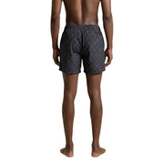 Ea7 men swimwear dark patterned swim trunks with subtle geometric design suitable for beach and pool use