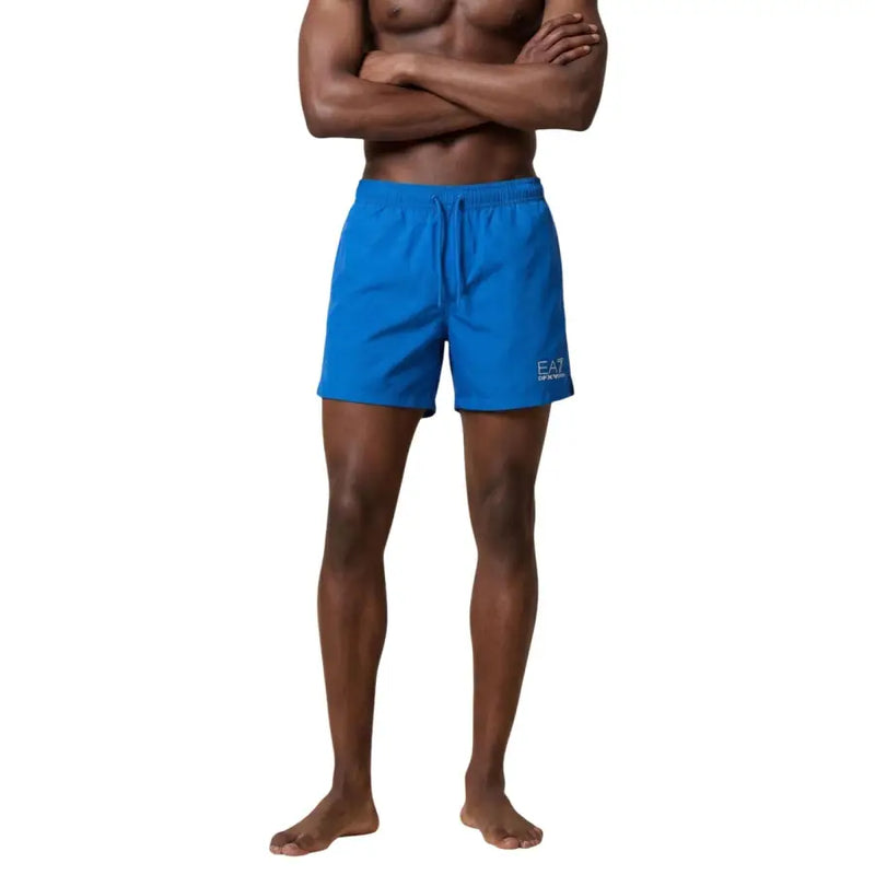 Bright blue ea7 men swimwear swim trunks with drawstring waistband and ea7 logo on the left leg for swimming