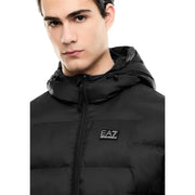 Ea7 puffer jacket for men in black with hood zipper closure and logo patch on chest, front view