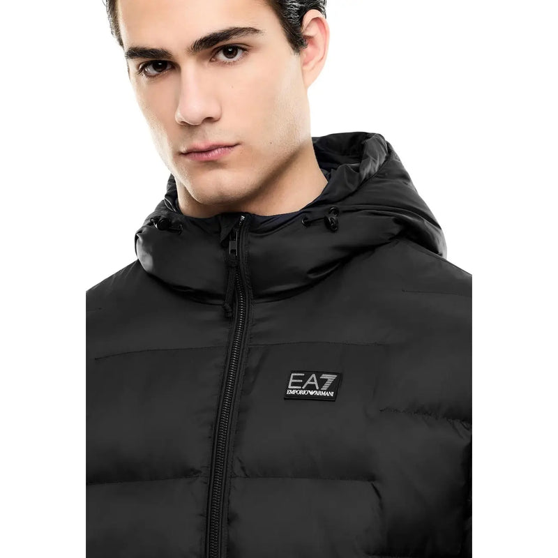 Ea7 puffer jacket for men in black with hood zipper closure and logo patch on chest, front view