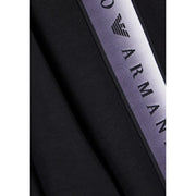 Ea7 Schwarzer Damen-Jumpsuit aus Baumwollmischgewebe mit lila-silbernen Farbverlaufsstreifen und Emporio Armani-Logo in schwarzen Buchstaben