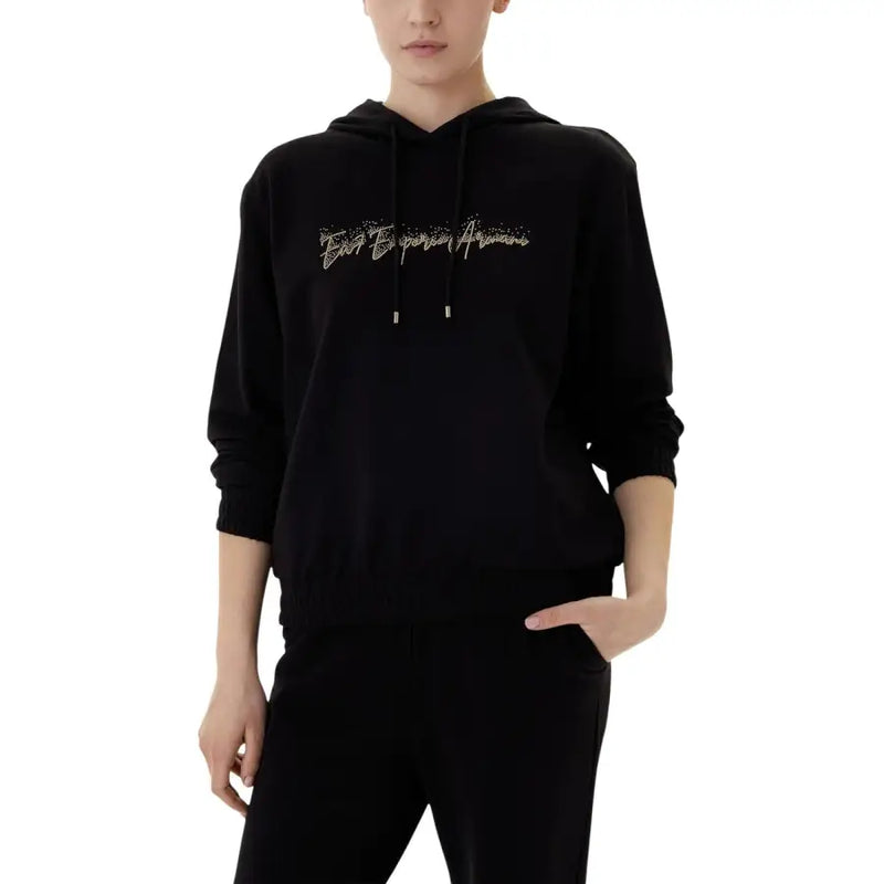 Ea7 women’s black hooded jumpsuit with pockets featuring a sparkling gold emporio armani logo on the chest