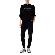 Ea7 women’s black hooded jumpsuit with pockets featuring a black kenzo hoodie and silver embroidered logo with matching joggers
