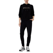 Ea7 women’s black hooded jumpsuit with pockets featuring a black kenzo hoodie and silver embroidered logo with matching joggers