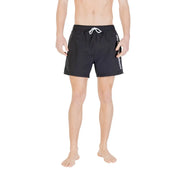Emporio Armani men swimwear black polyamide shorts with white drawstring and vertical branding on the side