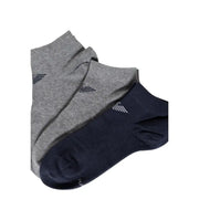 A pair of heather gray and navy blue Emporio Armani underwear ankle socks with a subtle side logo