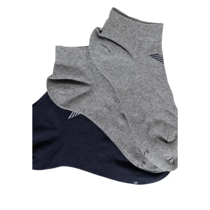 A pair of heather gray and navy blue Emporio Armani men’s ankle socks with subtle striped logos on the side