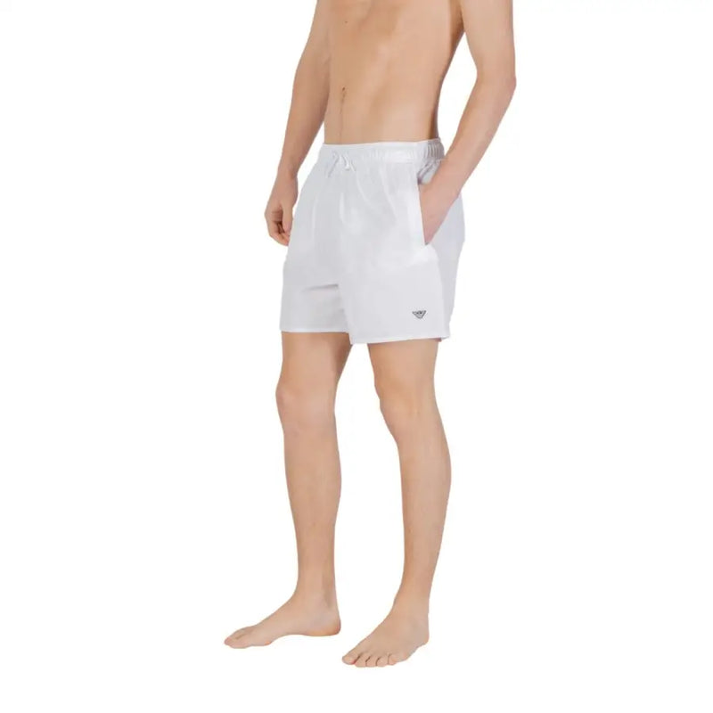 White men’s Emporio Armani swim trunks with a drawstring waistband and small logo on the lower left leg