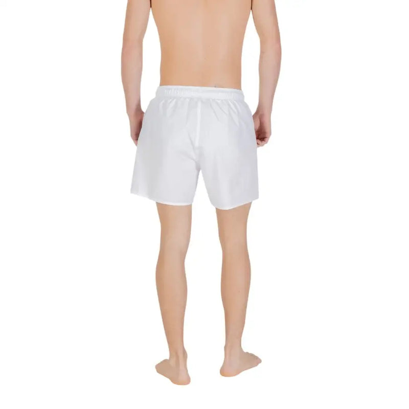 White cotton swim trunks with elastic waistband for men by Emporio Armani underwear swimwear collection