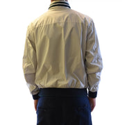 Beige bomber jacket with black ribbed collar and cuffs made of lightweight nylon paired with grey polyester zip turtleneck blazer by fay men