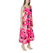 Fuchsia floral v-neck maxi dress with thin straps black and cream accents and a tiered skirt for elegant occasions