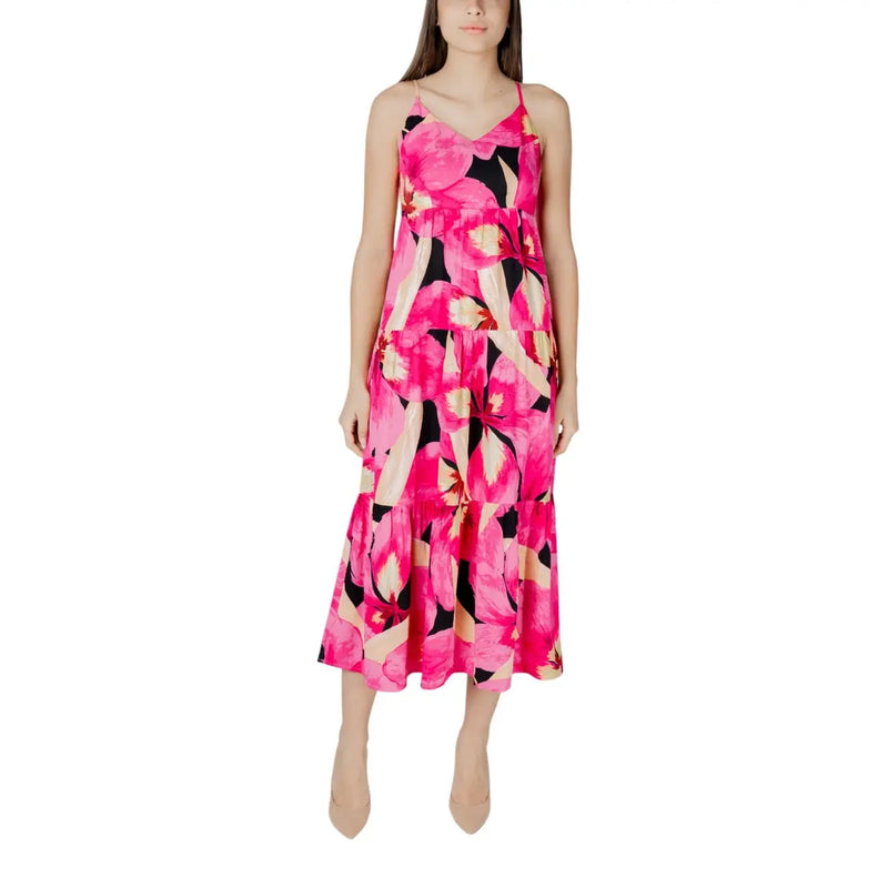Fuchsia floral v-neck maxi dress with thin straps and tiered skirt featuring pink, black, and beige accents
