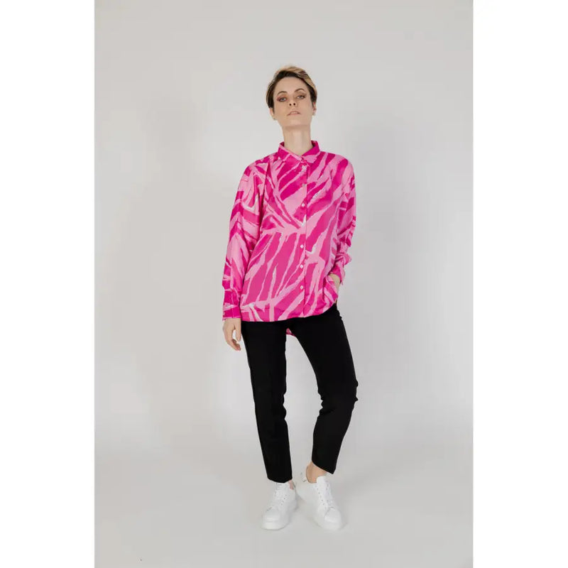 Fuchsia women’s long button-down shirt in vibrant pink and white zebra stripes with long sleeves for spring and summer