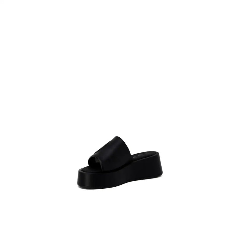 Furla women’s black leather platform slide sandal with a sleek minimalist design and smooth leather-like finish