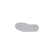 White rubber sole of furla women’s white leather and polyurethane sneakers with smooth textured surface and rounded edges