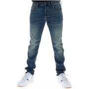 Back side of g-star men jeans 51001 featuring dark-wash slim fit denim with button fly cotton stretch and brown brand patch