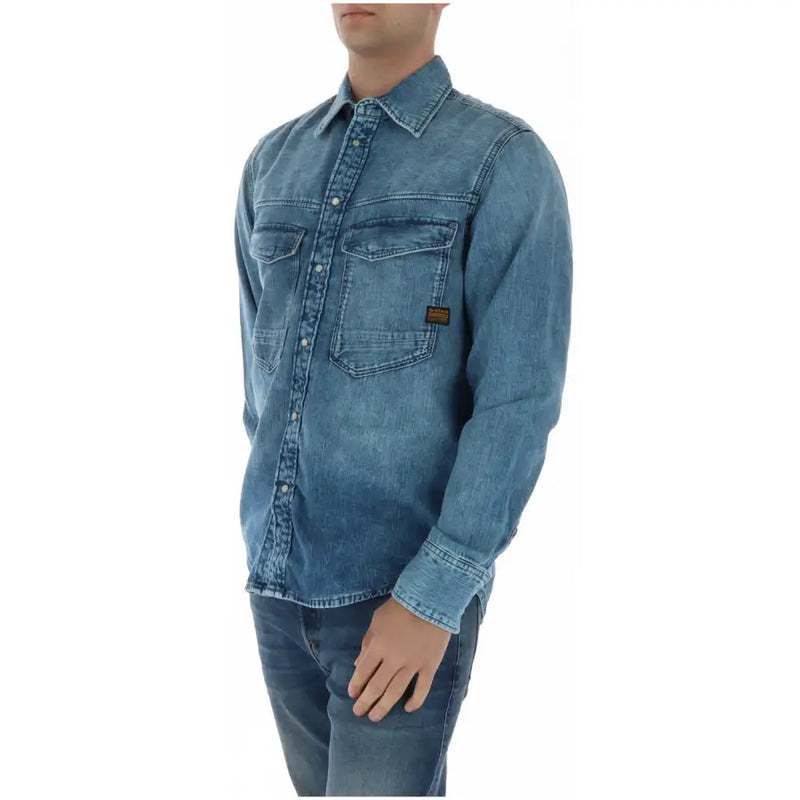 G-star men shirt blue denim long-sleeved with two chest pockets and small brown label on left pocket
