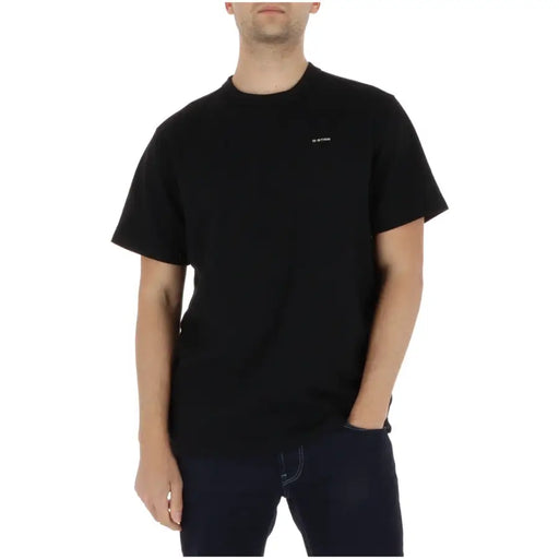 Black short-sleeved crew neck t-shirt with small white logo on left chest made of organic cotton by g-star men