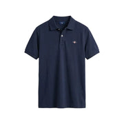 Navy blue Gant men polo shirt with buttoned collar short sleeve cotton pique and small embroidered logo on left chest