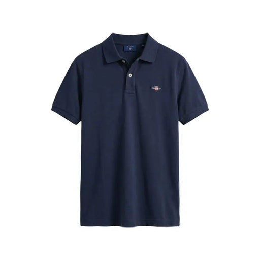 Marineblaues Gant Herren-Poloshirt mit Knopfkragen, kurzen Ärmeln, aus Baumwollpiqué und kleinem, gesticktem Logo auf der linken Brust.