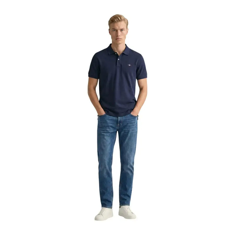 Navy blue gant men polo shirt with short sleeves cotton pique and small embroidered logo on left chest