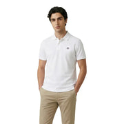 White short-sleeved cotton stretch polo shirt by Gant with subtle embroidered logo on the left chest